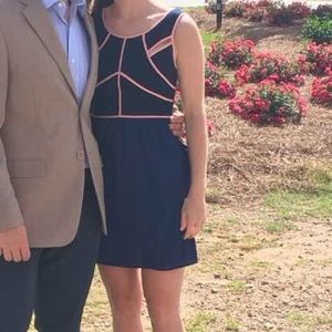 Boutique mini dress with pink piping and cutouts